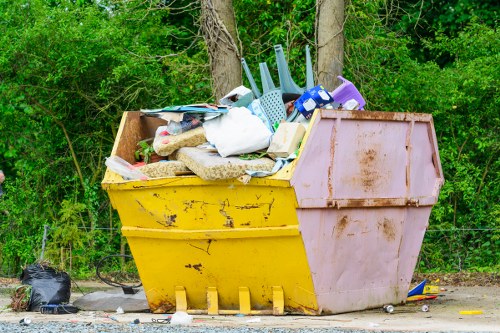 Workers sorting construction debris for recycling