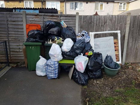 London construction site with builders waste clearance in progress