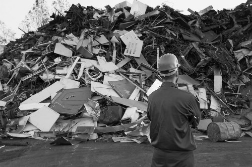 Waste clearance truck removing debris