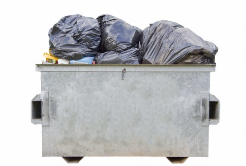 Workers sorting recyclable construction waste