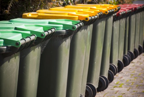 Workers safely removing builders' waste from site