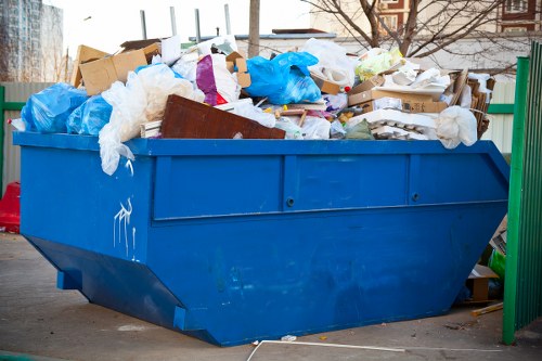 Crew managing builders waste clearance at Shooters Hill