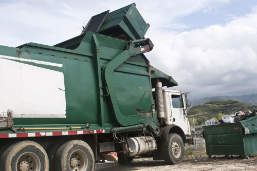 Workers handling demolition debris safely