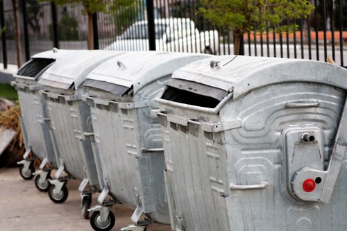 Heavy machinery and safety gear used in waste disposal