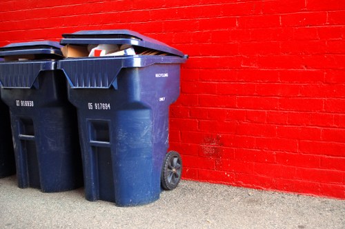 Workers sorting building materials for recycling