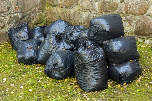 Waste management professionals clearing debris in Fortis Green