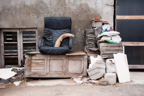 Construction workers managing builders waste clearance in Camberwell