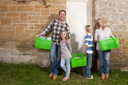 Workers managing builders waste clearance