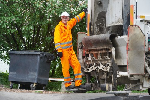 Professional team performing garden clearance services