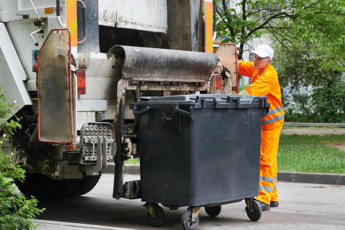 Clearance workers handling construction debris efficiently