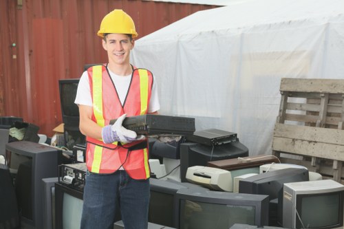 Professional team clearing construction waste