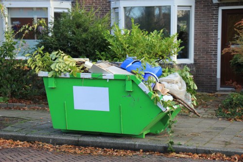 Waste clearance truck unloading materials