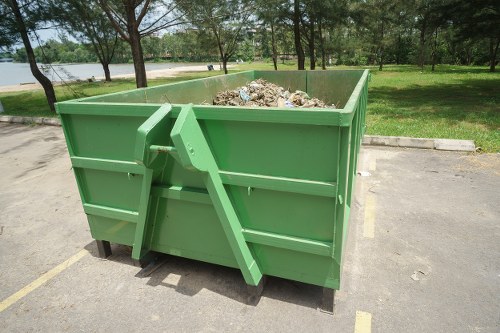 Modern waste clearance equipment in action at a construction site