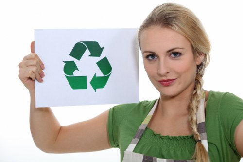 Eco-friendly waste management truck at work